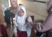 Siswa SDN Sumur Sapi Desa Tanjung Tiga Kecamatan Blanakan Kelas 1 Sampai Dengan Kelas V Di Lakukan Vaksinasi DT dan TD