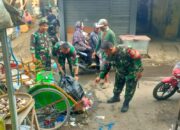 Personil Koramil 0620-14/Weru Turut Bersihkan Sampah Pasar