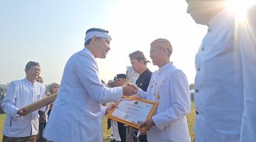Camat Mande Raih Piagam dari Menteri Hukum RI di Puncak HJC ke-349